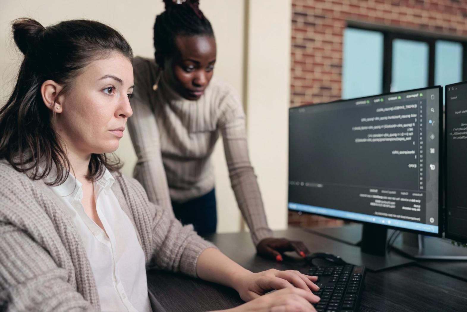 Developer team working through technical training materials