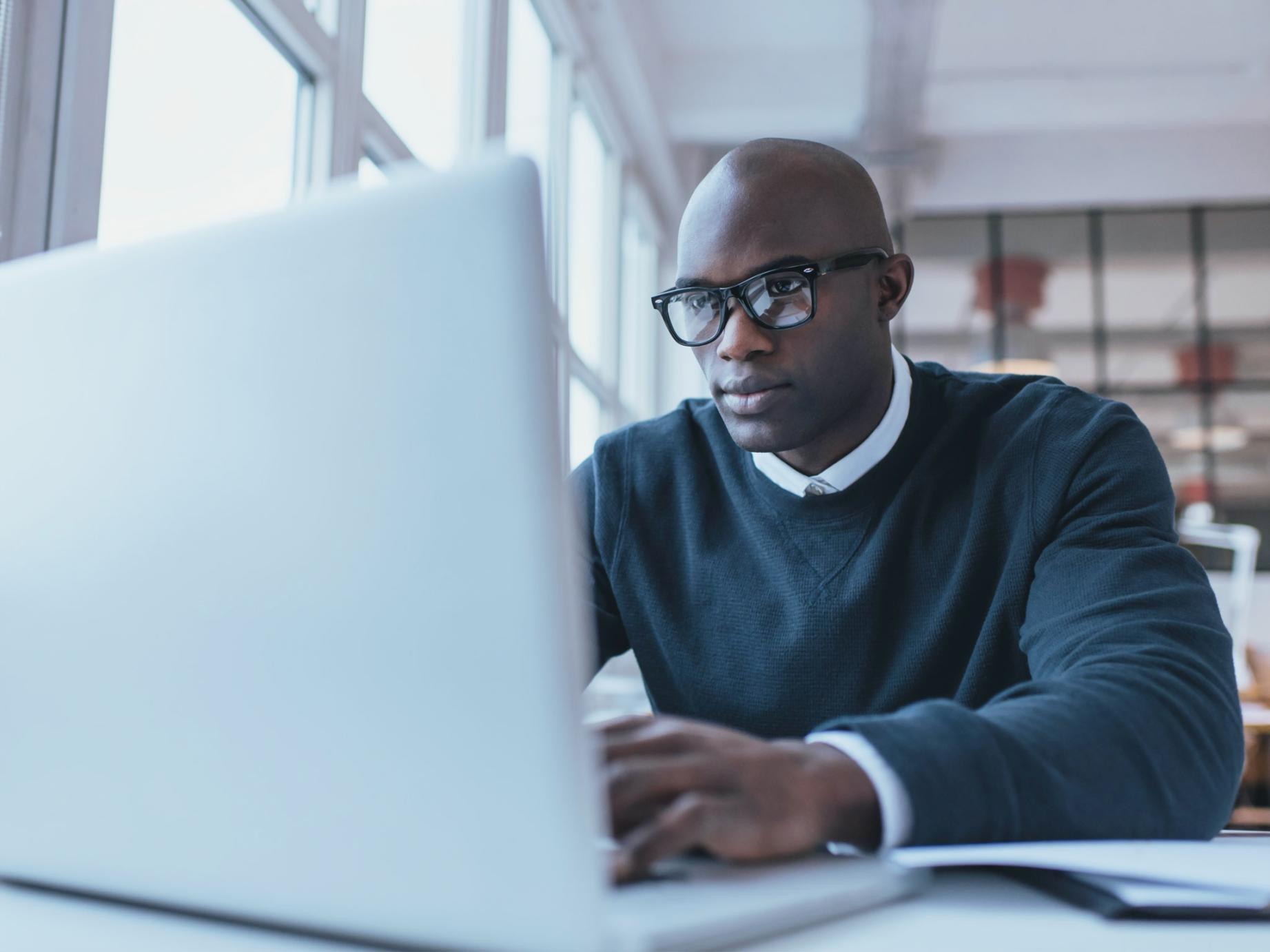 Front-end development training workspace with code and design elements